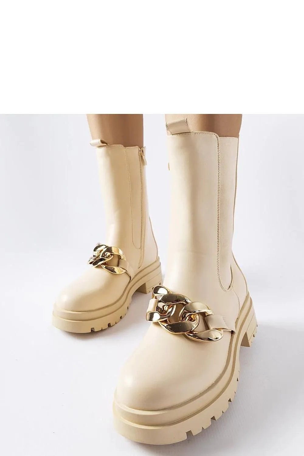 Beige ankle boots with chain